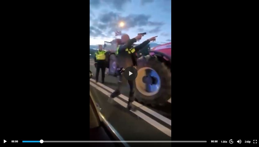 Dutch Police with Pistols Drawn Trying to Scare the Farmers