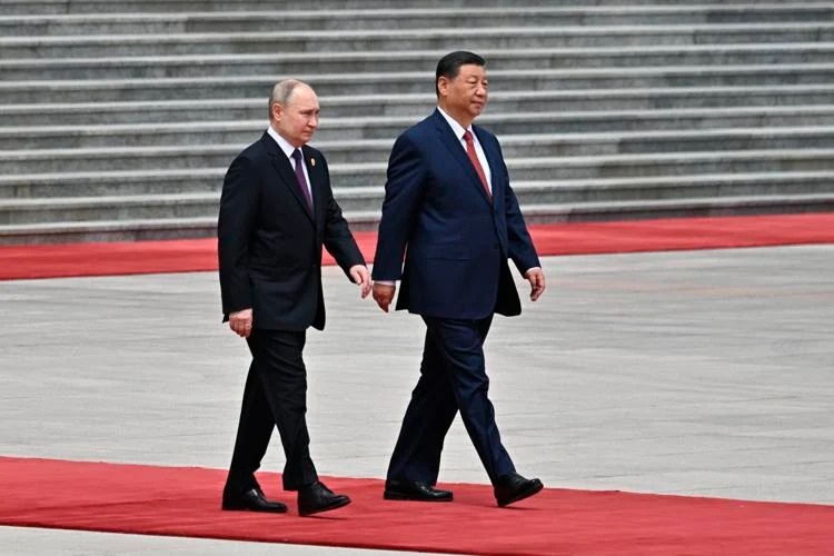 President Vladimir Putin Receives a Red Carpet Welcome in China